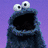 Pixelated Cookie Monster with wide eyes and open mouth on purple background, next to blue with red text NOT COOKIES!! and central food image