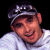 A pixelated contact sheet showing two frames of an animated icon with a person wearing a cap on the left and green text reading "Original Icons .com" on the right against a dark background.