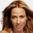 Two side-by-side pixelated frames of a woman with long brown hair against white background, left frame shows neutral expression, right frame shows smiling mouth and closed eyes.