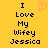 Yellow background with black pixelated text reading "I Love My Wifey Jessica" and a pink heart symbol above the word "Love" on the left side.