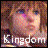 Pixelated image of a person with light brown hair and blue eyes, overlaid with text reading 'Kingdom' at bottom left and 'Hearts' at top right.