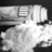A black-and-white animated icon shows a figure with layered hair and clothing, partially obscured by motion blur in the lower half.