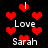 Red pixelated hearts float over a black background with repeated white text reading "Love" and "Sarah" in a pattern