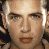 Six distinct facial close-ups arranged in a , each with unique lighting and color grading