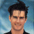 A pixelated image of a person with dark hair against a blue sky background, next to green text reading 'Original Icons .com' on a solid green field.