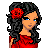 Pixelated character with dark curly hair and red flower, wearing red dress; text in red on white and red backgrounds