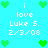 Pixelated cyan background with green heart icons and white text reading "i love Luke S. 2/3/08" arranged in a pattern