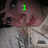 A person in a light-colored jacket with a green text overlay cycling through 'I', 'Love', and 'April' across four