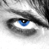 Static close-up of a human eye with blue iris, black pupil, and gray-scale surrounding skin rendered in pixelated style.