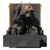 A stone gargoyle statue with glowing red eyes sits on a pedestal, flanked by golden staffs against a gray background.