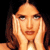 A 50x50 pixel animated contact sheet showing two frames of a celebrity-style icon with a woman in contrasting poses against black background.