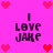 Pixelated pink background with four identical text blocks reading "I LOVE JAKE" surrounded by red and pink heart icons.