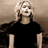 Static 48x48 pixel icon showing a person with light-colored hair wearing a black shirt against a neutral background.
