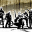 Black-and-white pixelated silhouette of four figures in a row against a gradient background, with one figure holding a weapon.