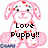 Pixelated pink puppy with red accents, black eyes, and text 'Love Puppy!!' in bold black letters across its chest.