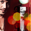 A static image shows a person with dark hair and a mustache wearing a dark necklace against a red background with blurred circular lights.