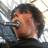 A pixelated image of a person singing into a microphone with red text reading "WOW He's Worse Than Avril" on the right side.
