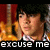 A static image of a person with dark hair in front of red and gold background, overlaid with text reading "excuse me im lookin for the swimmin pool".