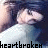 A pixelated image of a person with dark hair and light skin, wearing a white top, with the word 'heartbroken' displayed below in black text.