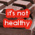 A static image of chocolate bars with overlaid text stating it's not healthy to pay attention to calories.
