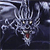 Pixelated dark blue and gray creature with glowing yellow eyes, red tongue, and multiple horns against a dark background.