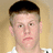 Pixelated portrait of a person with short brown hair against beige background, blue field with yellow text reading BE INTIMIDATED I'M A BEAST!!!!!! BIG EAST PLAYER OF THE YEAR!