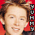 A 3x2 contact sheet of six animated frames showing a person with light brown hair against a red background, each frame featuring vertical "YUMMY" text on the right side.