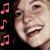 A four- shows a person with red hair smiling, accompanied by musical notes and text labels
