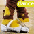 Pixelated image of a person in yellow boots and brown pants dancing, with the word 'dance' displayed on a yellow banner above.