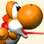 Pixelated orange character with large round head, white belly, red accents on limbs and neck, black eye detail, holding a long thin object against light background.