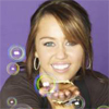A person with brown hair and large hoop earrings holds a small object against a purple background with colorful circular overlays.