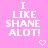 Pixelated text on pink background with two heart symbols, each heart has a small white dot in the center.