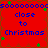 Red background with blue text reading 'close to Christmas' and scattered green star shapes.