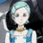 Static pixelated image of a character with light blue hair, dark side bangs, and a white-and-blue outfit against a dark background.