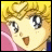 Pixelated anime-style character with blonde hair and large eyes, wearing pink and blue clothing, next to stylized text on a black background.