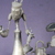 A pixelated static image shows a tall, slender metallic structure with multiple arms extending from its top against a solid purple background.