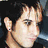 Pixelated image of a person with dark hair and an earring, next to text reading 'Sprout = AmazingGorgeous & :]'.