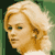 Pixelated static image of a person with light brown hair and fair skin in profile view against green background.