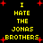 Yellow pixelated text on black background with red starbursts, repeating 'I HATE THE JONAS BROTHERS' in two vertical