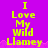Yellow text on purple background reads "I Love My Wild Llamey" with pixelated edges and a pink wave-like border at the bottom.
