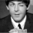 A 48x48 pixel animated contact sheet showing two frames of a black-and-white portrait on the left and green text logo on the right against a dark background.