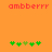 Pixelated orange background with red text 'ambberrr' at top and green clover-like symbols at bottom, showing animation change in symbol positions.