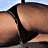 Animated sequence showing a person in a black strappy top with shoulder straps, transitioning from a side view to a front view with visible hair and blue sky background.
