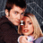 A four- shows a man and woman in close pose with pixelated text overlays changing