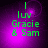 Green text on purple background with subtle light effects, showing 'I luv Gracie & Sam' in pixelated font across four