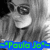 Black-and-white photo of a person with long hair and sunglasses, overlaid with blue text reading "-"Paula Jo"-" and purple pixelated shapes.