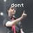 A person in a dark shirt with a red tie points right, with text above changing from 'dont' to 'go there' across frames.