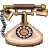 Pixelated static image of a vintage rotary telephone with a cream-colored base, metallic gold accents, and a black-and-white rotary dial.