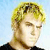 Animated contact sheet showing two frames of a pixelated character with blonde hair and black shirt alongside a diagonal CoolBuddy.com logo on teal background.