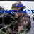 A pixelated image of a person in military camouflage gear with blue text overlays reading U.S. Navy and Seals.